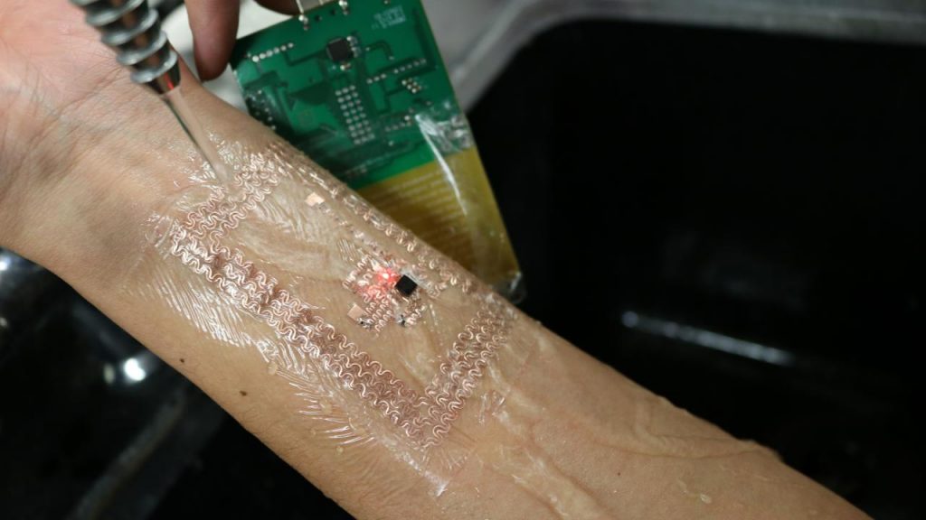 A wearable, skin-interfacing device dubbed the e-tattoo functions as a personalized health monitor. The battery-free technology is an example of the innovative research of Hyoyoung Jeong, an assistant professor of electrical and computer engineering. (Courtesy of Jeong)